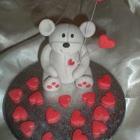 Valentine's Day Teddy More modelling this time teddy has 2 wired hearts and hand painted hearts on his tummy and 2 on his bum.