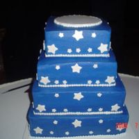 Congrats Jessica And Drew Made this 4 tiered sqaure stacked cake for a cousin on mine's wedding. She wanted the darker blue for dress military blues. I chased...