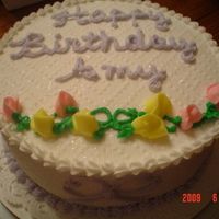 Hb Amy 8" white cake with BC frosting. I used a diamond pattern off of the paper towel to get a diamond pattern ontop of the cake. Scrolled 2...