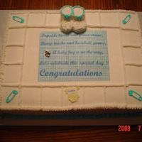 God Bless A Newborn Made this 11x15 1/2 and 1/2 with BC frosting. Booties are marshmellows. I took the blue plaid and saying from her invitation. The cake was...