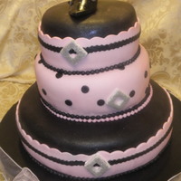 Pink & Black Stilletto Cake Chocolate with Raspberry Filling, Chocolate with Almond Cream Cheese Filling, and Lemon Poppy seed with Almond Cream Cheese Filling. All...