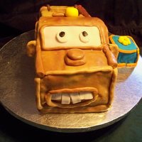 Tow Mater Yellow cake, fondant covered. Smash block cake same, yellow cake, fondant covered.