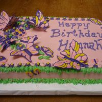 First Ri Butterflies Strawberry cake with strawberry BC frosting and decorations - RI butterflies