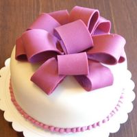 Ma First Fondant Covered Cake this one was made for wilton course 3 class two first fondant covered cake dint take time to complete but i enjoyed the neat look