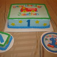 Fun At One Birthday Cake This is a french vanilla cake with half strawberry and half lemon filling - BC icing with fondant accents - made to match plates and...