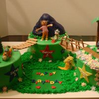 Dora The Explorer This was a super fun cake to make. It was made for a birthday party for a 3 year old and twin 2 year old.