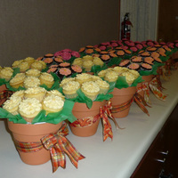 25 Cupcake Bouquets I made 25 cupcake bouquets for my annual Master Gardener luncheon. I made three flavors-- Guinness stout w/brown sugar meringue buttercream...