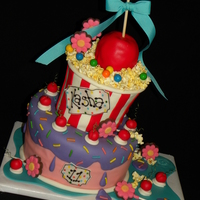 Kasha's 11Th A 9" base, topsy turvy style. Real popcorn and gumballs. All the rest is fondant. Based on a style by Andrea's SweetCakes on...