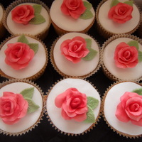 Roses cupcakes to go with flower and lace cookies for engagement. made to match serviettes
