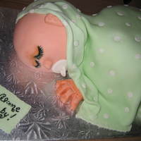 Sleeping Baby Carrot cake with cream cheese icing covered in fondant