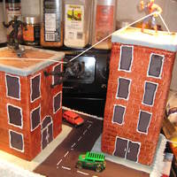 Spiderman White/Chocolate cake with buttercream icing, buildings made out of styrofoam and fondant