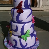 Lavender Butterfly Cake Marshmallow Fondant Lavender & purple, 4 tier cake with 4 layers in each cake, filled with Lemonchillo frosting (recipe is on CC) &...
