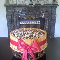 Tiramisu Cake Lady finger cake batter wth coffee, rum, Kahlua mascarpone mousse filling and lady finger soaked in coffee & Kahlua coffee liqueur in...