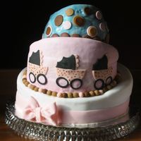 Baby Shower Cake Topsy Turvy This was very difficult as my second topsy cake. The top layer was supposed to be facing other way with the slant, but wouldn't fit....