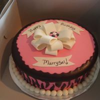 Zebra Pink Black And White Birthday cake for a gf daugther. Last minute! Vanilla cake covered in fondent and mmf accents.