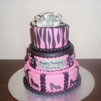 Sweet Sixteen Pink And Black Yet another pink and black cake.This one is for my daughters sweet sixteen birthday!! Fondant with chocolater buttercream. Bow and silver...