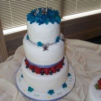 Engagement Cake White cake with fresh strawberry and blueberry filling and buttercream icing covered with rolled fondant. Gum paste flowers, chocolate...