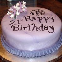 21St Birthday With Lilacs MMF fondant covered marble cake and my attempt at gum paste lilacs.This cake looked great until I messed up the lettering.