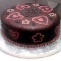 V-Day.jpg Chocolate cake with dark chocolate buttercream and chocolate fondant. I was asked by office mates how I did the decorations :-)