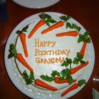 Carrot Cake Carrot cake with cream cheese icing for my Grandma's birthday. Carrots molded from marzipan with flat-leaf parsley stuck in for the...