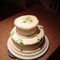 Wilton Iii Class This was from my third Wilton Course and, since I missed the class that thoroughly tought fondant, I went with a buttercream tiered cake...