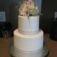 Simplicity buttercream w/ ribbon and flowers