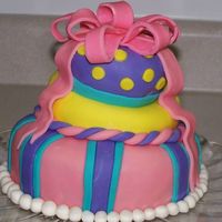 My Very First Fondant Cake! This cake was the first one I ever made. I wasn't sure what to expect with the fondant but it was pretty easy except for the bow (as...