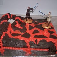 Star Wars Revenge Of The Sith Mustafar Scene Cake My son wanted this cake for his birthday. I made two 12 x 18 cakes stacked. Molded a volcano and rocks out of rice crispy treats. The lava...