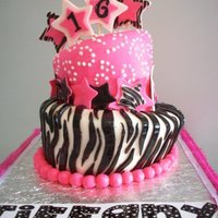 Topsy Turvy Sweet Sixteen Birthday! This is a cake done for a sweet sixteen birthday. Top tier is chocolate, bottom is vanilla, paired with vanilla buttercream icing and...