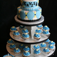 Prince Theme 1St Birthday Cake Fondant covered cake with matching cupcakes and smash cake.