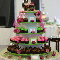 Wedding Cupcake Tower This was a lot of fun! I love the idea of cupcakes for a wedding, and this tower turned out soooo well!