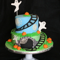 Spooky Train Cake Fondant covered cake with all fondant decorations.