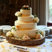Simply Elegant Wedding Cake This is a 4 Tier wedding cake covered in Mousseline Buttercream and accented with fresh flowers. I'm VERY pleased with how this cake...
