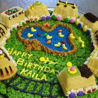 Kailas_11Th_Birthday_4A.jpg Made this for my niece's 11th birthday. The kids really had fun choosing their own piece of train to eat. I used the Train set pan...