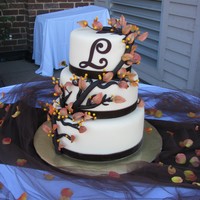 Fall Wedding Cake All White chocolate fondant with gumpaste leaves and choc fondant branches