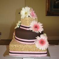 Rice Krispie Wedding Cake Made of all Rice Krispie Treats and middle tier is RKT covered in Fondant