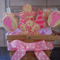 Cookie Basket For Baby Girl this is my first attempt at a cookie basket for friend who just had a baby. sugar cookies rolled very thick with lollipop sticks and...