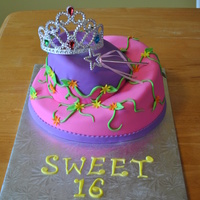 Princess Topsy-Turvy Cake This was for my cousin's Sweet 16....Chocolate-chocolate chip with chocolate buttercream and marshmallow fondant.