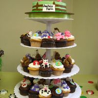 Cupcake Tree Choc and French Vanilla Cupcakes, with Fondant Animals. Top cake is a red velvet cake w/buttercream . This was inspired by a few different...