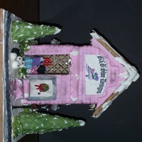 Shoe Shop This Gingerbread creation was made for the local hospital to auction off. The cake club that I am a member, all picked a shop to make. It...