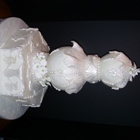 Multi-Shaped Luster Cakes made out of multi-shapes. Covered in Fondant and airbrushed with Luster Dust.