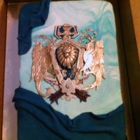 World Of Warcraft Themed Cake I made this cake for my husband for his birthday in '08.He and I both play World of Warcraft. It was all done in fondant, and this was...