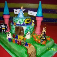 Princess Jewel And Hero Michael Made this cake for our kids who share a birthday, she wanted cinderella castle theme and he wanted batman. So I combined it using a "...