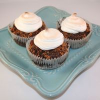 S'more Cupcakes Chocolate cupcake with crushed graham crackers and chopped chocolate, with a marshmallow topping ( put under the broiler for a minute to...