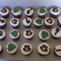 St Patty's Day Cupcakes iced in BC, decorated with st patty's themed chocolates!