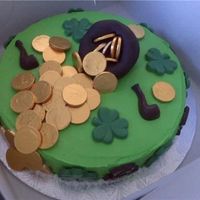 St Patrick's Day Iced in buttercream, decorated with St Patrick's Day chocolates, fondant pot of gold, and chocolate coins!