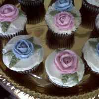 Practicing Roses Just learned how to do roses, lol. Chocolate fudge cupcakes with buttercream! Yummy!