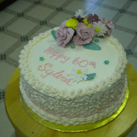 First Gumpaste Flowers cherry chip cake with IMBC; made gumpaste flowers for the first time. It was more fun than piping them! I know they're a little rough...