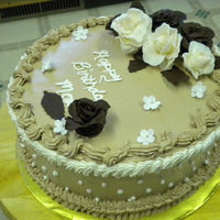 First Time With Candy Clay Chocolate cake with chocolate IMBC; my first attemt to make chocolate roses. I used Merkens white and chocolate disks. Funny thing about...