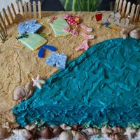 Beach 11x15 french vanilla with pineapple buttercream filling. Ground up sugar cookies for sand. Was short on time, cheated with decorations on...
